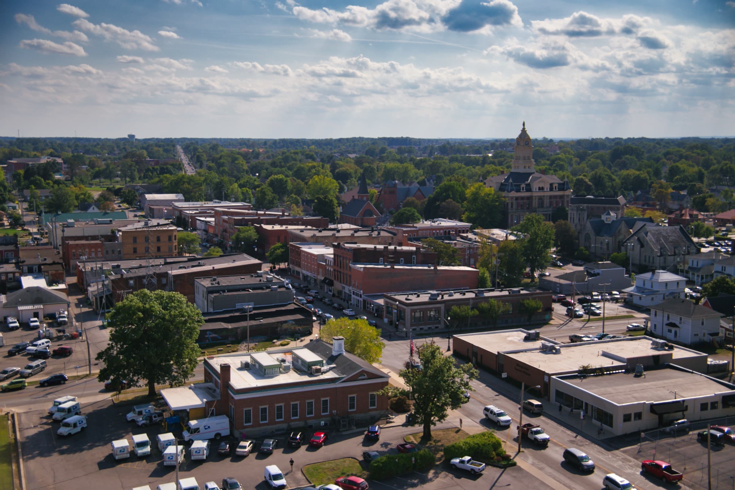 Aerial view of Uptown Marysville, Ohio, with the Union County Courthouse tower in the distance